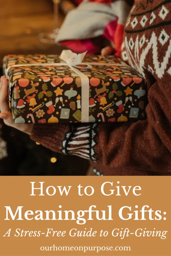 close up of woman holding gift with caption "How to give meaningful gifts: a stress-free guide to gift-giving".
