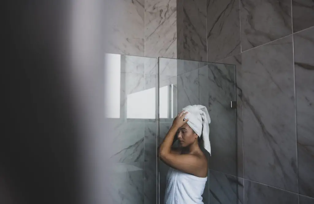 Woman in clean shower. 